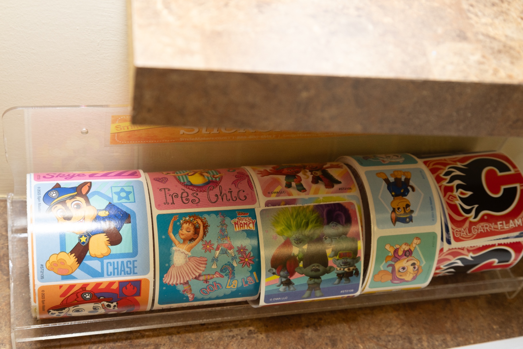 Close-up of the sticker rolls in their holder